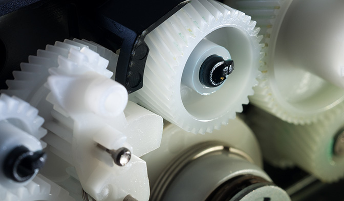 Close-up detailed view of gears in a machine's mechanism