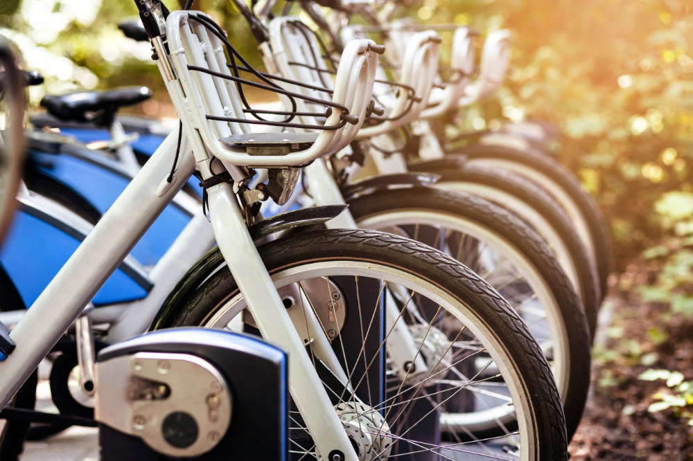 stock image depicting a row of e-bikes